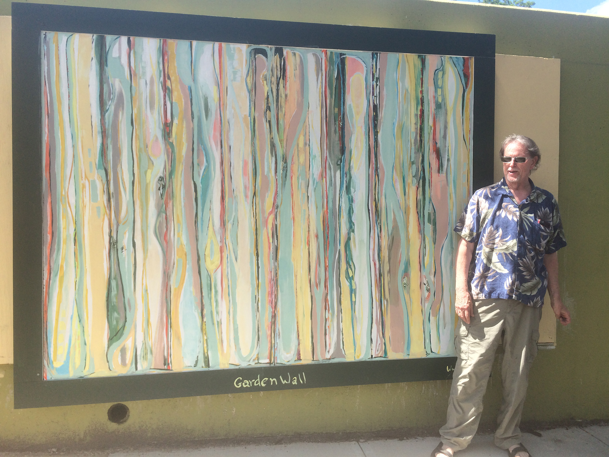 Don Wunderlee in front of his Public Mural in New Haven CT